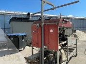 Foto van lift bosmachine oogster